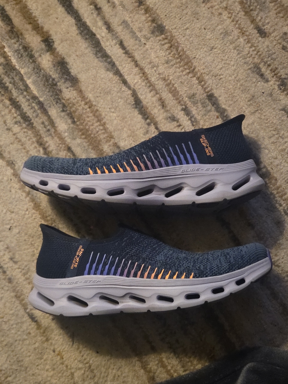 Skechers Men's Navy Slip-On Athletic Shoes with Purple and Orange Accents